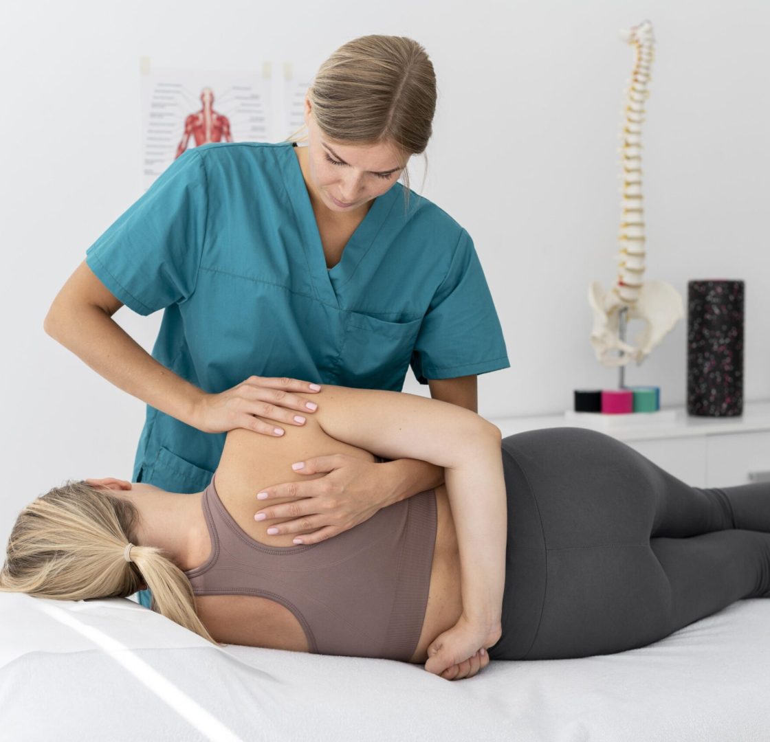 physiotherapist-helping-patient-her-clinic